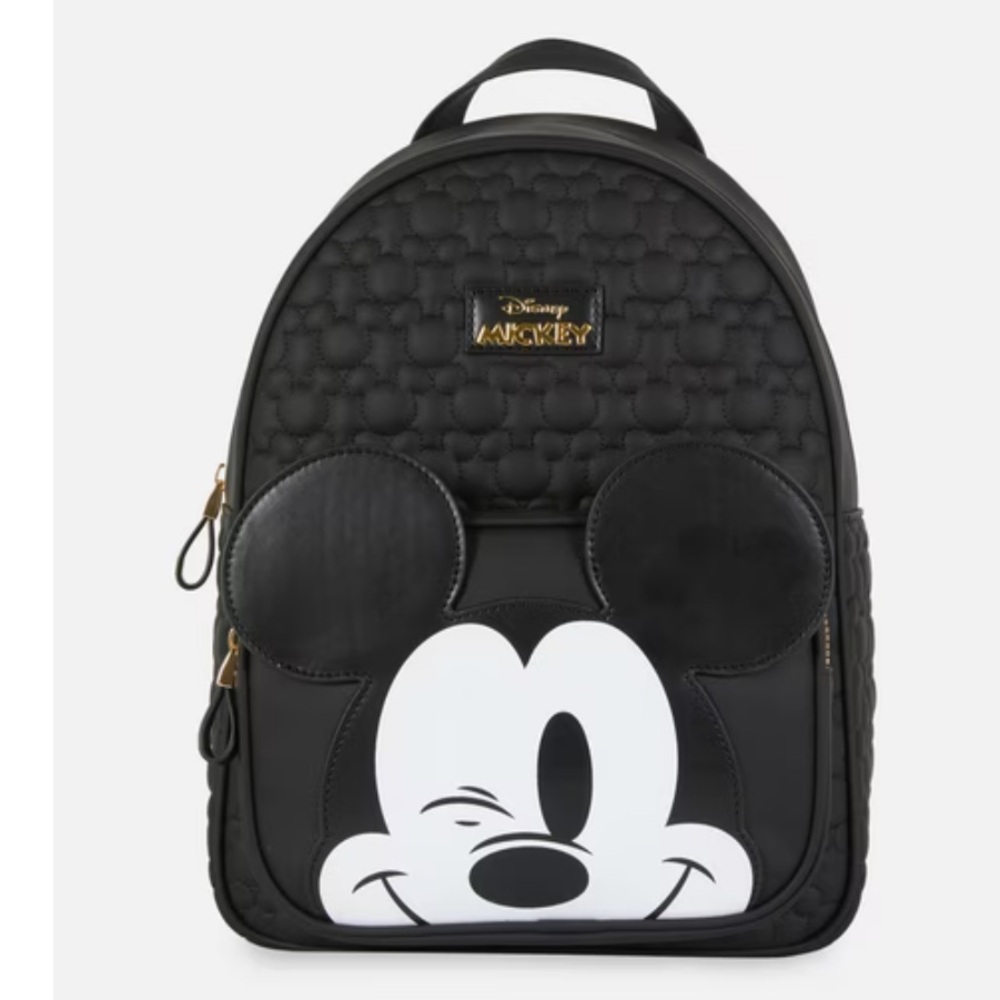 Disney Mickey Mouse winking Mickey medium faux leather backpack.